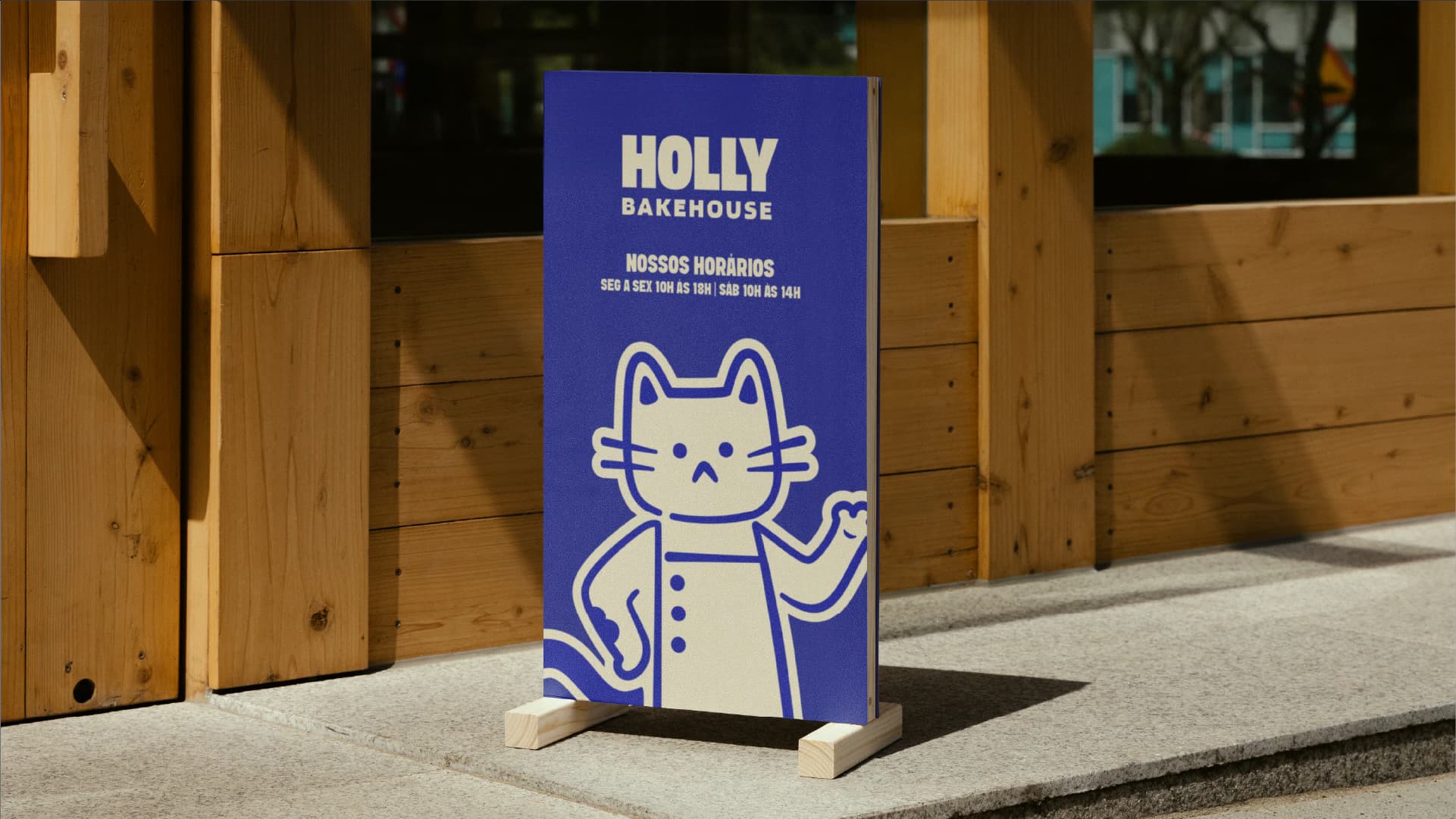 Totem de calçada com o mascote da Holly Bakehouse